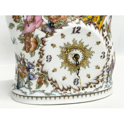 286 - Hutschenreuther. A Late 20th Century German 3 piece porcelain clock set. By Hutschenreuther. Clock 2... 