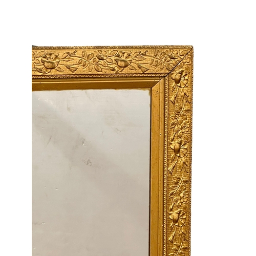 296 - A large 19th Century Victorian gilt framed mirror. 104x85cm