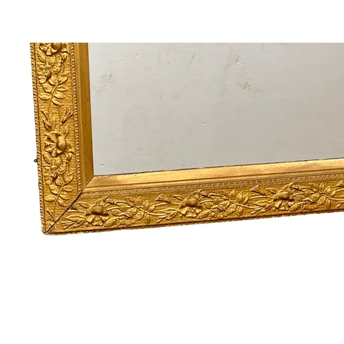 296 - A large 19th Century Victorian gilt framed mirror. 104x85cm