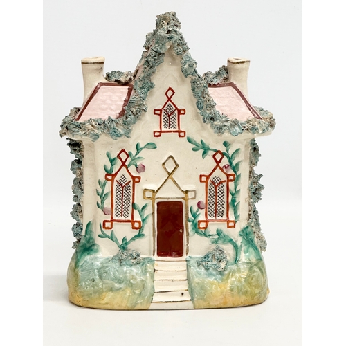 328 - A 19th Century Victorian Staffordshire Pottery cottage. 16x22cm.