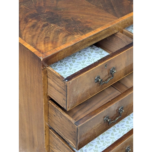 369 - An Early 20th Century George III style mahogany chest of drawers with inlaid cross-banding. 76x44.5x... 