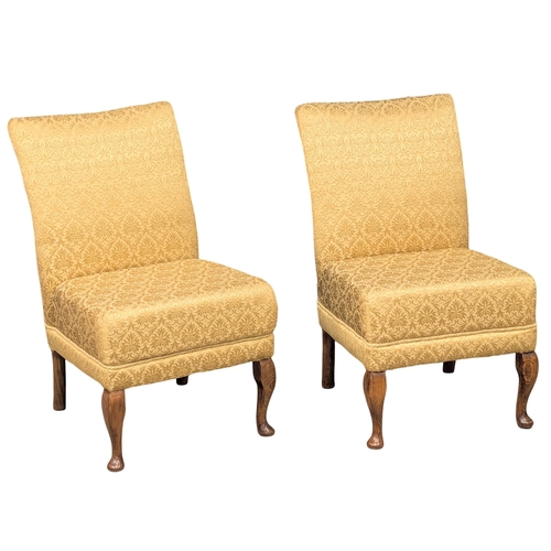 1007 - A pair of Mid 20th Century fireside / cocktail chairs with original upholstery. (10)