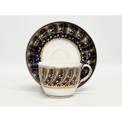 88 - Coalport. An Early 19th Century 4 piece tea and coffee service. Coffee can, 2 tea cups, saucer. Geor... 