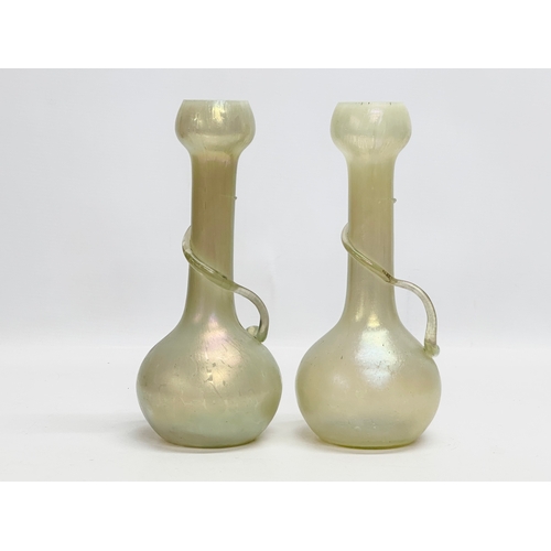 40 - Josef Rindskopf. A pair of Bohemian “Snake Trail” iridescent uranium glass vases. By Rindskopf & Co.... 