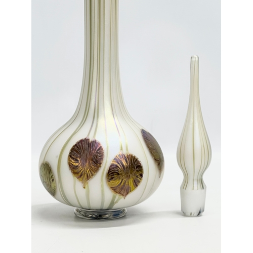 11 - Richard P Golding. A large signed “Golden Lily” iridescent glass decanter. Designed by Richard P Gol... 