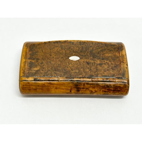 52 - An Early 19th Century Late George III/George IV curly birch snuff box with mother of pearl inlay. Ci... 