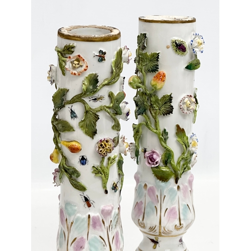 121 - A pair of Early 19th Century flower encrusted spill vases, decorated with insects on Corinthian styl... 