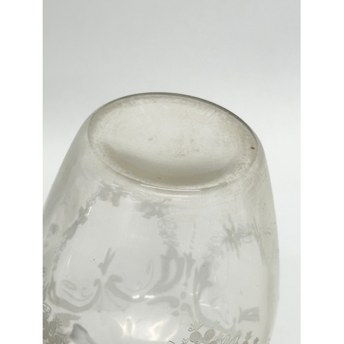 107 - A 19th Century Victorian etched glass decanter. 23cm