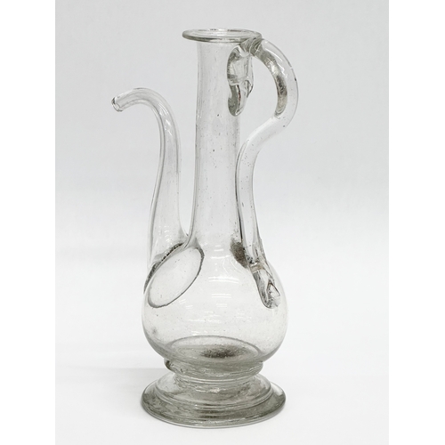 106 - An 18th Century hand blown glass oil bottle. George III. Circa 1780. 11x16cm