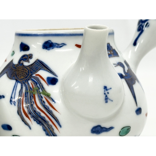 66 - Takano Shōami. A Japanese hand painted ceramic teapot. Takano Shōami, Kyoto, Japan. 13x10x9cm