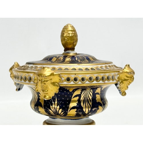 84 - Early Crown Derby. An Early 19th Century gilt potpourri pot with cover. With acorn handle, mask rims... 