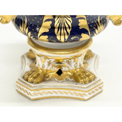 84 - Early Crown Derby. An Early 19th Century gilt potpourri pot with cover. With acorn handle, mask rims... 