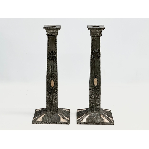 95 - A pair of tall Early 20th Century Art Nouveau pewter and mother of pearl candlesticks. Circa 1900. 1... 