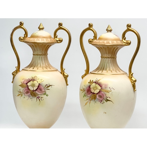 132 - William Adams. A pair of large Late 19th Century Crown Semi Porcelain baluster urns with covers. Han... 