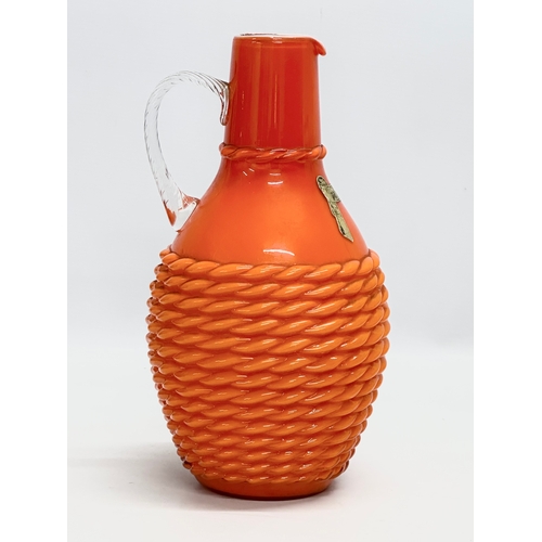 154 - Stelvia Glass. A large Mid Century Italian “Opalina Fiorentina” rope twist glass pitcher. 1970. Empo... 