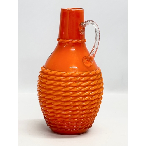 154 - Stelvia Glass. A large Mid Century Italian “Opalina Fiorentina” rope twist glass pitcher. 1970. Empo... 