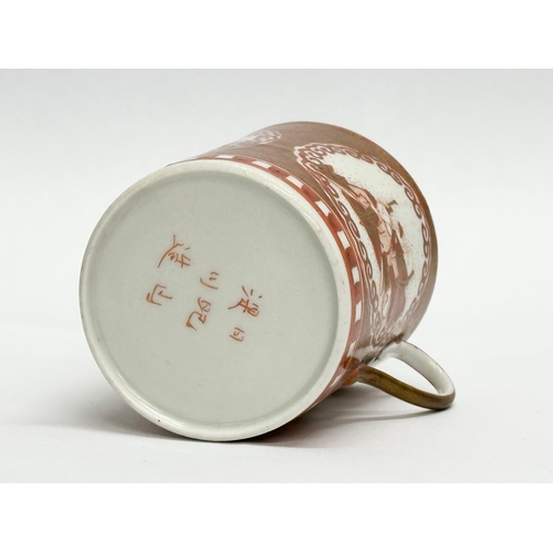 74 - 2 pieces of signed Late 19th Century Japanese pottery. A Kutani hand painted cup and saucer with 6 c... 