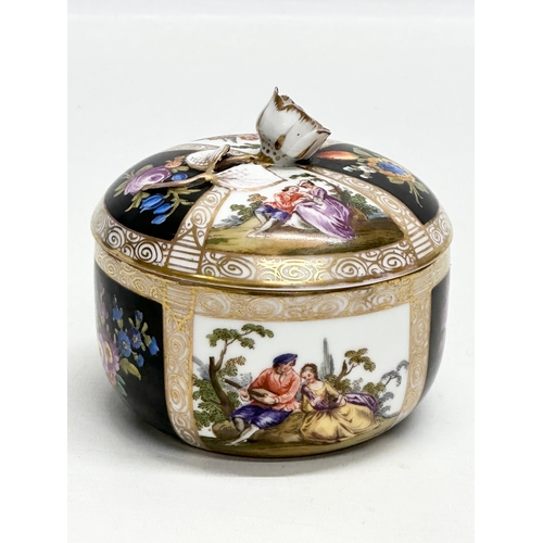 138 - Augustus Rex. A Late 19th Century hand painted porcelain trinket box with cover and rose handle. 10.... 