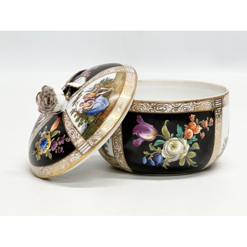 138 - Augustus Rex. A Late 19th Century hand painted porcelain trinket box with cover and rose handle. 10.... 