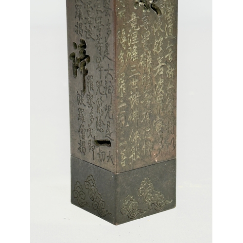 181 - A Chinese bronze stick incense burner. 13.5cm