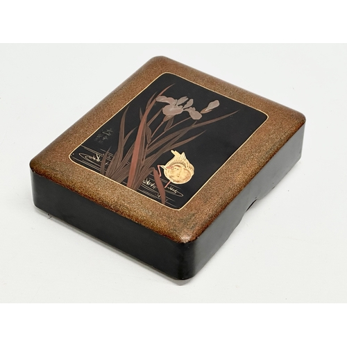 182 - A signed Japanese hand painted lacquered box. 17x20x5.5cm