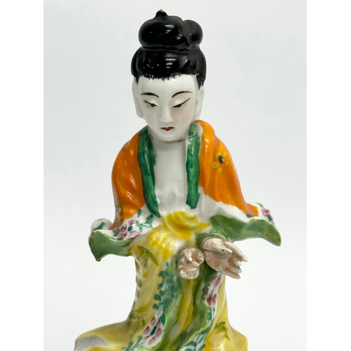 185 - A Chinese Kwan Yin pottery statue. Early 20th Century, Early Republic Period. 18cm