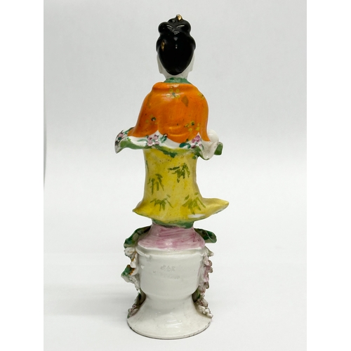 185 - A Chinese Kwan Yin pottery statue. Early 20th Century, Early Republic Period. 18cm