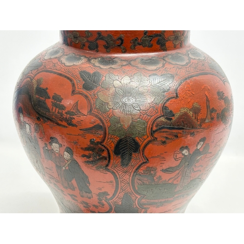 76 - A large 19th Century Chinese painted papier mache baluster pot with cover. 28x46cm