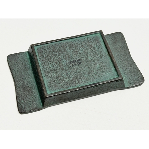 186 - A Japanese Nambu Tekki iron ashtray. 14x8cm