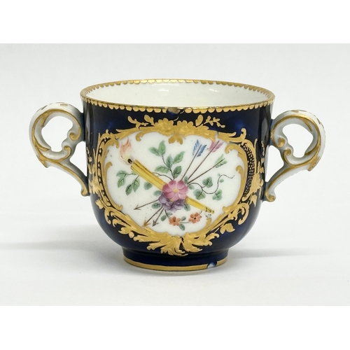 96 - A 19th Century Sevres hand painted chocolate cup and saucer.