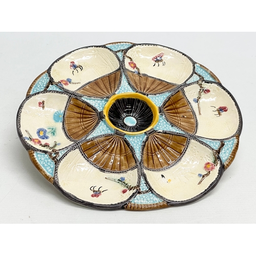 3 - Simon Fielding & Co. A rare set of 4 Late 19th Century Majolica “Fan & Insect” oyster plates. Circa ... 