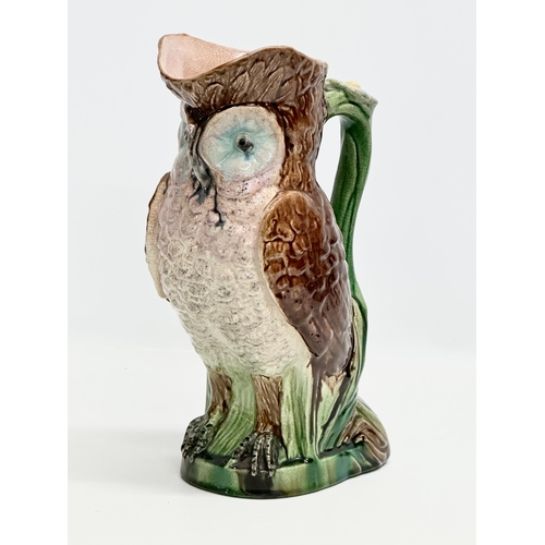 139 - A Late 19th Century Majolica owl pitcher. 26x29cm