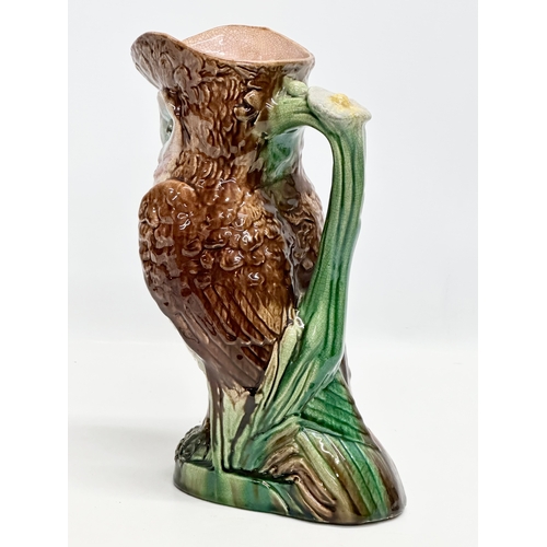 139 - A Late 19th Century Majolica owl pitcher. 26x29cm