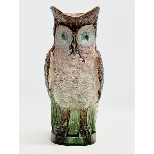 139 - A Late 19th Century Majolica owl pitcher. 26x29cm