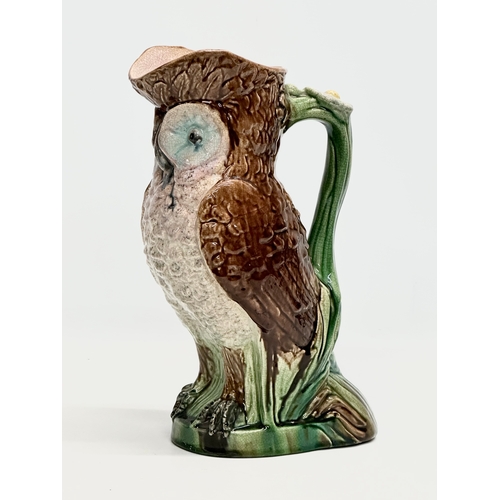 139 - A Late 19th Century Majolica owl pitcher. 26x29cm