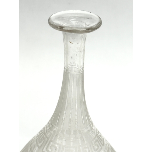 169 - A collection of 19th Century glassware. A small Late 19th Century etched glass decanter with Greek K... 