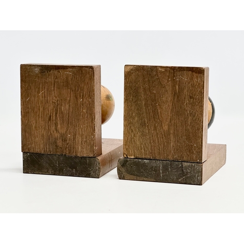 189 - A pair of Mid 20th Century Japanese Kokeshi doll bookends. Circa 1950. 13x10x13.5cm