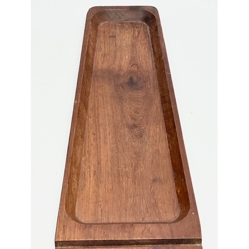 125 - A 1960’s Mid Century teak cheese board tray. By Benco. 17x63cm