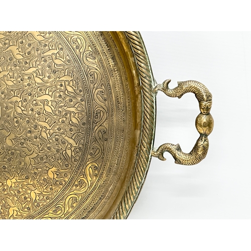 289 - A large Late 19th Century Indian style engraved brass tray. 77x44cm