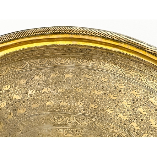 289 - A large Late 19th Century Indian style engraved brass tray. 77x44cm