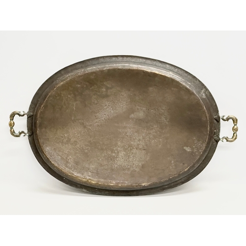 289 - A large Late 19th Century Indian style engraved brass tray. 77x44cm