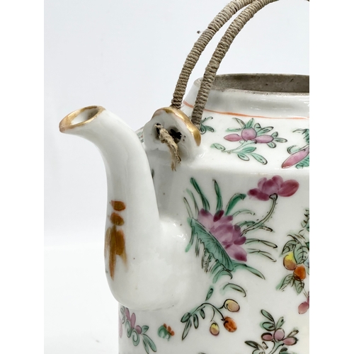 290 - A Chinese Late Qing Dynasty Famille Rose teapot. Late 19th/Early 20th Century. Circa 1900. 18x13x17c... 