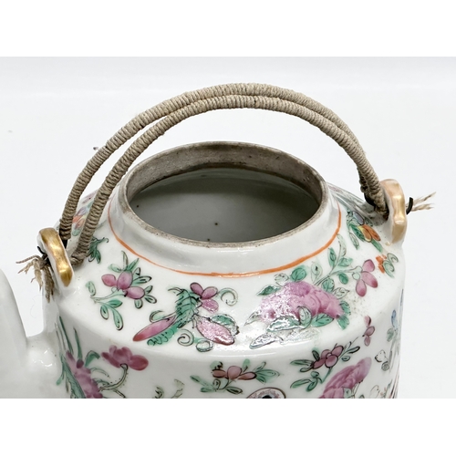 290 - A Chinese Late Qing Dynasty Famille Rose teapot. Late 19th/Early 20th Century. Circa 1900. 18x13x17c... 