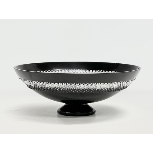 220 - A large glass centrepiece bowl by John Rocha for Waterford. 35x13cm.