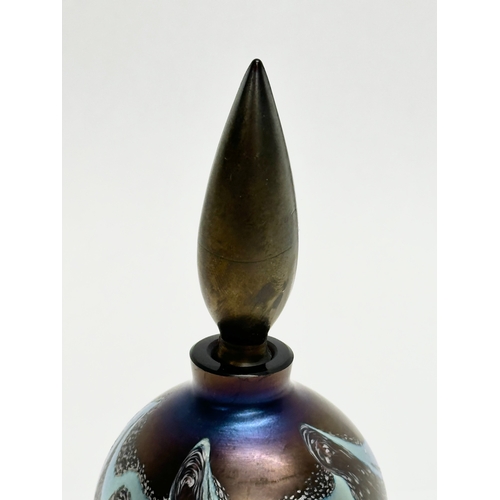 217 - An Okra Glass iridescent perfume bottle. 12cm