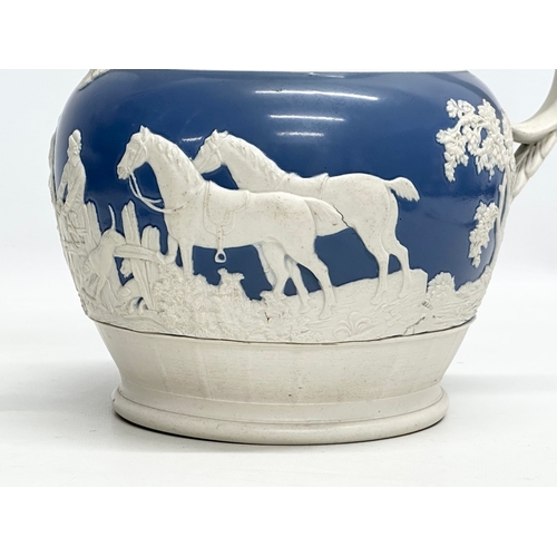 207 - A large Early 19th Century Chetham & Woolley Feldspathic stoneware water jug. Hunting scene. Circa 1... 