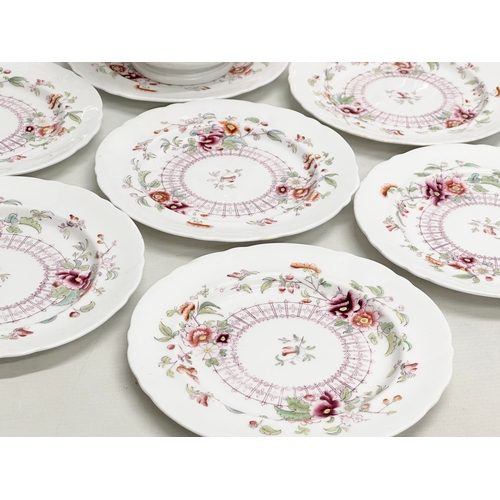 99 - James Duke & Nephews. A Late 19th Century famille rose part dinner service. Circa 1863. 11 salad pla... 