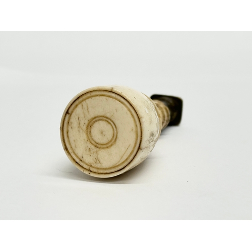 78 - A 19th Century bone wax seal. 8cm