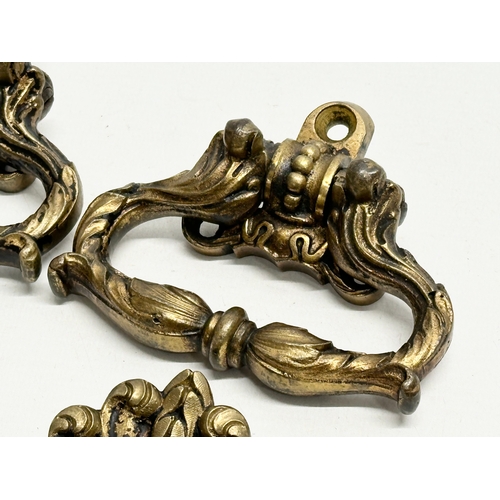 210 - A pair of vintage brass Copley trunk pulls. 10x9cm