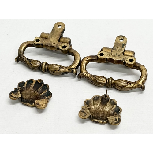 210 - A pair of vintage brass Copley trunk pulls. 10x9cm